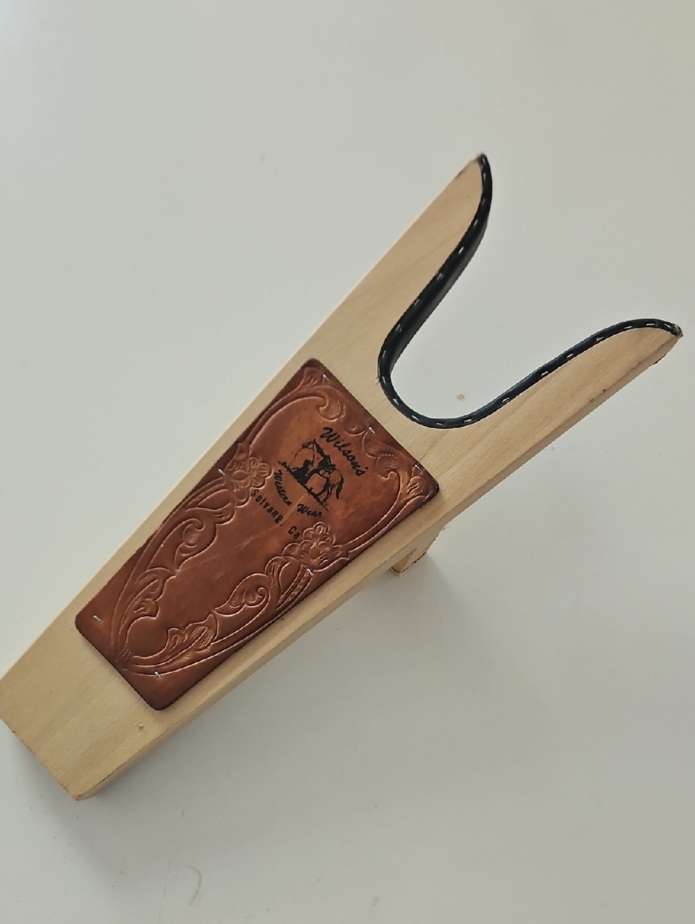 Leather-Accented Wooden Boot Jack in Natural with Copper Plate